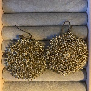 Sparkly earrings with cutout and stone details